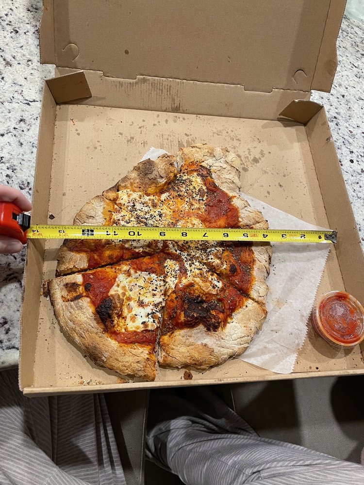 Famulari's Pizzeria Cane Bay Logo