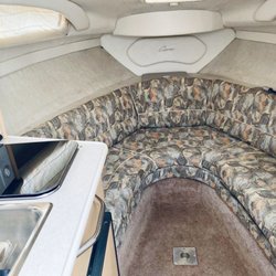C&M Upholstery - Before photo with dated fabric.