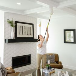 Live Clean Today - A worker doing Ceiling dusting