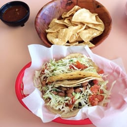 Photo of Tacos Moreno - Santa Cruz, CA, United States. Corn quesadilla (taco form), al pastor taco and chips and salsa