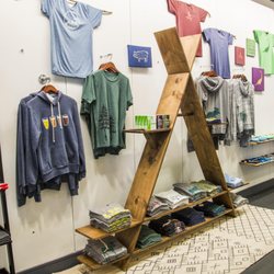 Cinder and Salt - Camp collection on our hand-crafted wooden tent display