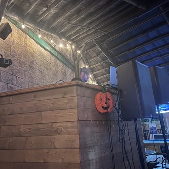 Taiga Club - a wooden bar with a pumpkin decoration - Pubs Near Me - Tampa, Florida Taiga Club - a wooden bar with a pumpkin decoration - Pubs Near Me - Tampa, Florida
