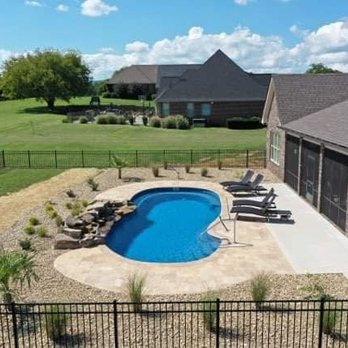 PRO Outdoor Concepts - a view of a backyard with a pool - Fences & Gates Near Me - Dayton, Tennessee PRO Outdoor Concepts - a view of a backyard with a pool - Fences & Gates Near Me - Dayton, Tennessee