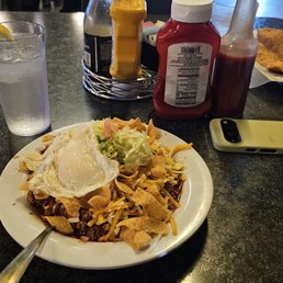 Frito pie with an over easy egg Frito pie with an over easy egg