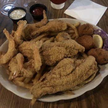 The Chimes Covington - Boatload---- fish, shrimp & stuffed shrimp w/ fries & hush puppies - Pubs Near Me - Covington, Louisiana The Chimes Covington - Boatload---- fish, shrimp & stuffed shrimp w/ fries & hush puppies - Pubs Near Me - Covington, Louisiana