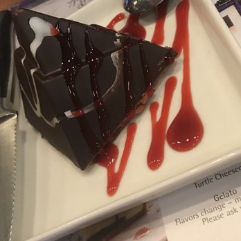 Tryst Cafe PHX - Sex... I mean deliciousness.. some chocolate  pyramid with chocolate mousse and raspberry drizzle - Beer, Wine & Spirits Near Me - Phoenix, Arizona
