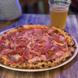 Village Pizza & Pasta - We asked for meaty for him.