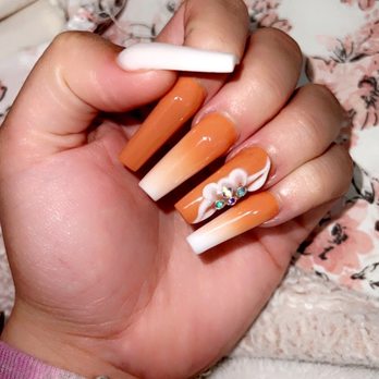 Nexus Nails & Pedi Spa - Orange ombré set with flower design! - Nail Salons Near Me - Sugar Land, Texas Nexus Nails & Pedi Spa - Orange ombré set with flower design! - Nail Salons Near Me - Sugar Land, Texas