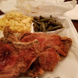 Fried pork chops w/ hotsauce, mac and cheese, and green beans. Fried pork chops w/ hotsauce, mac and cheese, and green beans.