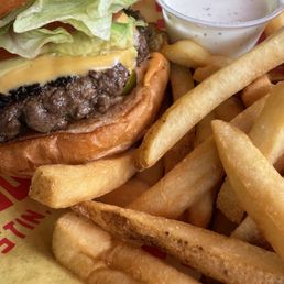 Avocado Jalapeño burger with blue cheese and fries Avocado Jalapeño burger with blue cheese and fries