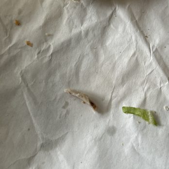 Subway - a half eaten sandwich on a piece of paper - Fast Food Near Me - Hanceville, Alabama