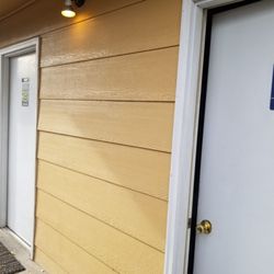 K & M Burgers and More - Restrooms outside at the end of the building.