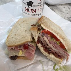 Fisher's Deli - Turkey, roast beef, ham, meunster, lettuce and sweet peppers on sourdough