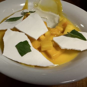 Botánico - Coconut panna cotta topped w/ diced sweet mango, meringue & basil; best dessert we had all week! - Seafood Near Me - México, D.F., DIF Botánico - Coconut panna cotta topped w/ diced sweet mango, meringue & basil; best dessert we had all week! - Seafood Near Me - México, D.F., DIF