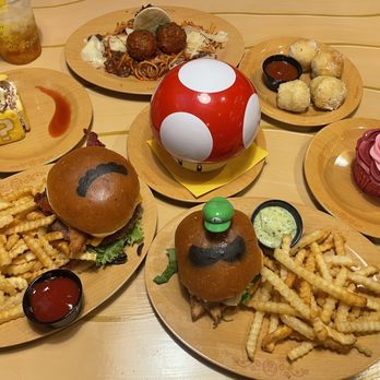 Toadstool Cafe - Mario Burger, Luigi Burger, Super Mushroom Soup. Fire Flower Spaghetti, Garlic Knots, Block Tiramisu, Princess Peach Cupcake - Cafes Near Me - Universal City, California