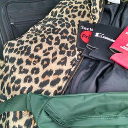 Dig & Save Outlet - Suit case, jacket, fanny pack, and three koozies = $3.38!