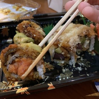 Dragon Palace - brown dragon roll (in chopsticks) and Mario roll - Chinese Near Me - Wyoming, Rhode Island
