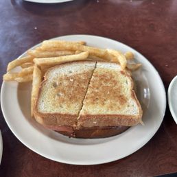 Grilled cheese with tomato and fries