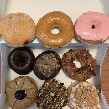 Glaze Donuts - New Milford - Top: jelly filled, glazed, strawberry frosted Middle: rainbow cookie, Reese's, maple bacon Bottom: PB&J, Twix, cannoli - Donuts Near Me - New Milford, New Jersey