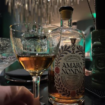 Civility & Unrest - a bottle of amarro nonno - Cocktail Bars Near Me - Bellevue, Washington