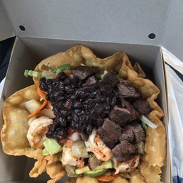 Skirt steak and jumbo shrimp tostada salad
