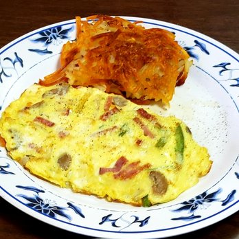 Jack's Inn - International Omelette with Hash Browns - (2) eggs with ham, cheese, mushroom, round onion, & green peppers ($8.75). - Breakfast & Brunch Near Me - Kahului, Hawaii Jack's Inn - International Omelette with Hash Browns - (2) eggs with ham, cheese, mushroom, round onion, & green peppers ($8.75). - Breakfast & Brunch Near Me - Kahului, Hawaii
