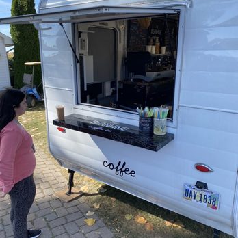 The Beanhive Coffee - a woman standing in front of a coffee truck - Coffee & Tea Near Me - Tipp City, Ohio The Beanhive Coffee - a woman standing in front of a coffee truck - Coffee & Tea Near Me - Tipp City, Ohio