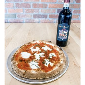 Kork Wine Bar - Advertised pepperoni pizza. - Wine Bars Near Me - Georgetown, Texas Kork Wine Bar - Advertised pepperoni pizza. - Wine Bars Near Me - Georgetown, Texas