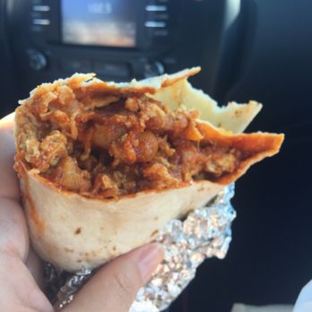 El Parasol - Ugly photo, but you have to see the inside. Red chile bacon breakfast burrito - Mexican Near Me - Santa Fe, New Mexico