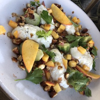 Outerlands - burrata with peaches, toasted almonds and some kind of pickled onions (I think). Really delicious - and perfect with their bread! - New American Near Me - San Francisco, California