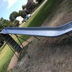Stillwater Park Playground - Picture of the older metal slide. Kids seem to love it as it's faster and smoother than the newer plastic ones.