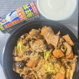 Mala Dry Pot with rice. Coconut drink.
