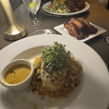 Cutlass & Cane - Sea Bass fish with curry sauce on the side - Seafood Near Me - St Thomas, Virgin Islands Cutlass & Cane - Sea Bass fish with curry sauce on the side - Seafood Near Me - St Thomas, Virgin Islands