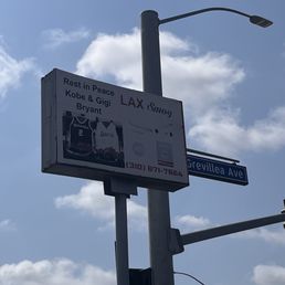 LAX Smog sign on Century and Grevillea.