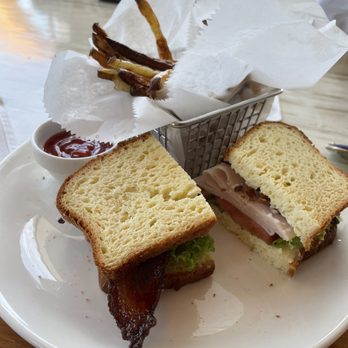 Food & Thought 2 - Turkey Club with air fries on gluten free bread - Restaurants Near Me - Naples, Florida Food & Thought 2 - Turkey Club with air fries on gluten free bread - Restaurants Near Me - Naples, Florida