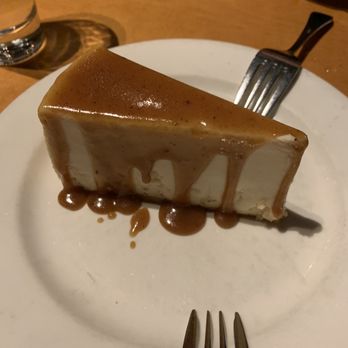Lombardi's Italian Restaurant - New York cheesecake with buttered rum garnish - Italian Near Me - Everett, Washington Lombardi's Italian Restaurant - New York cheesecake with buttered rum garnish - Italian Near Me - Everett, Washington