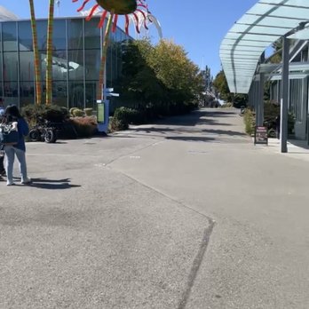 Seattle Center - Sonic Bloom sculpture on left & Chihuly Gardens & Glass on right | IG: @nomwithelaine - Amusement Parks Near Me - Seattle, Washington