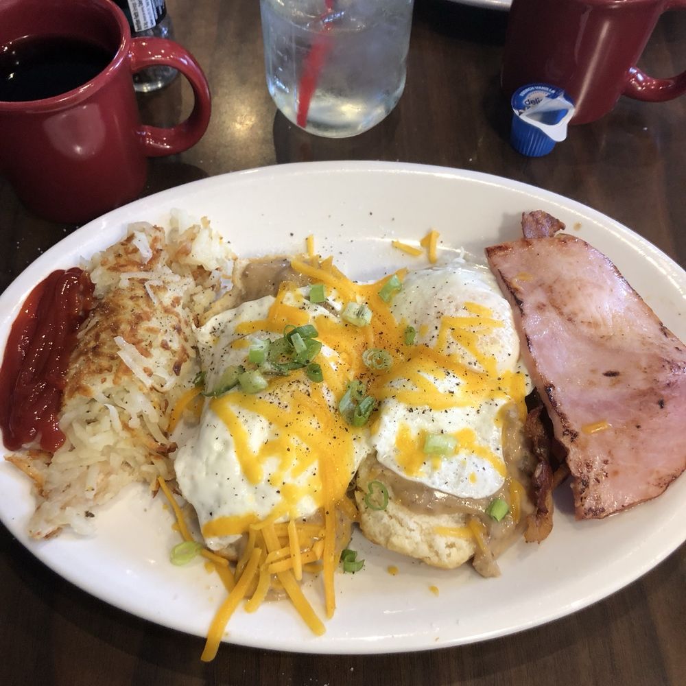 Bob Evans - Hash  browns, biscuits covered with gravy and eggs. Ham. - American Near Me - Muskegon, Michigan