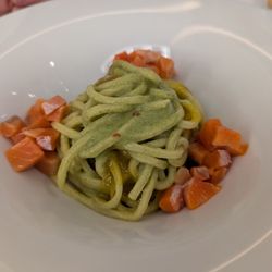 In - Pasta with zucchini pesto, salmon tartare, dill, and candied lemons