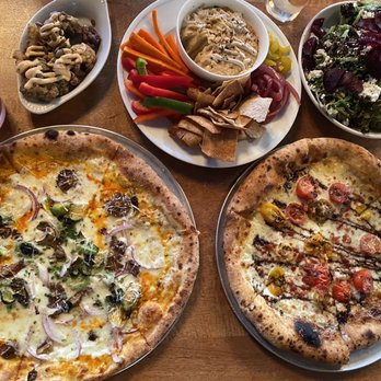 Hydraulic Hearth - Top: Old Dog New Tricks, Crispy Cauliflower, Hummus Platter, Kale Caesar, Thin Man Sun is Shining Bottom: Seasonal Farmer's Pie, Burrata Pie - Pizza Near Me - Buffalo, New York Hydraulic Hearth - Top: Old Dog New Tricks, Crispy Cauliflower, Hummus Platter, Kale Caesar, Thin Man Sun is Shining Bottom: Seasonal Farmer's Pie, Burrata Pie - Pizza Near Me - Buffalo, New York