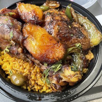 Punta Cana Dominican Grill - Pollo guisado- dark meat with rice and gandules and fried platains. Delicious - Dominican Near Me - Westbury, New York Punta Cana Dominican Grill - Pollo guisado- dark meat with rice and gandules and fried platains. Delicious - Dominican Near Me - Westbury, New York