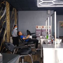 EyeCandy Waxing & Threading Brow Salon - Threader and Customer.