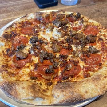 Yard House - The Carnivore Pizza (topped with pepperoni, beef, sausage, and bacon) - New American Near Me - Bakersfield, California Yard House - The Carnivore Pizza (topped with pepperoni, beef, sausage, and bacon) - New American Near Me - Bakersfield, California