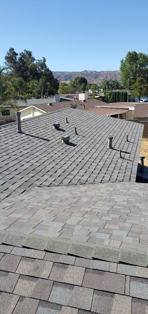 Slide of Three Clovers Roofing