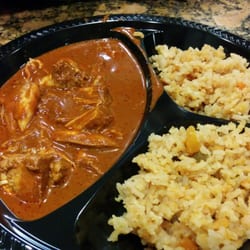 Mmm... Tamales - Yummy!!!  Homemade chicken mole with mexican rice.