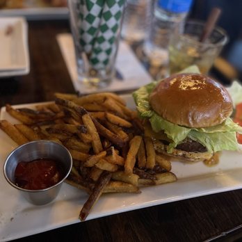 Green Street Local - a burger and fries on a plate - Sports Bars Near Me - Chicago, Illinois