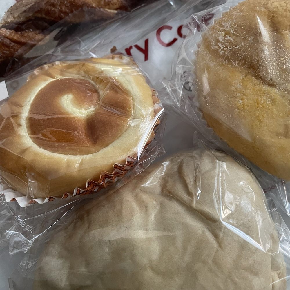 85°C Bakery Cafe-Flushing - Milk pudding bun, cinnamon twist, mango custard bun and marble taro - Bakeries Near Me - Flushing, New York 85°C Bakery Cafe-Flushing - Milk pudding bun, cinnamon twist, mango custard bun and marble taro - Bakeries Near Me - Flushing, New York