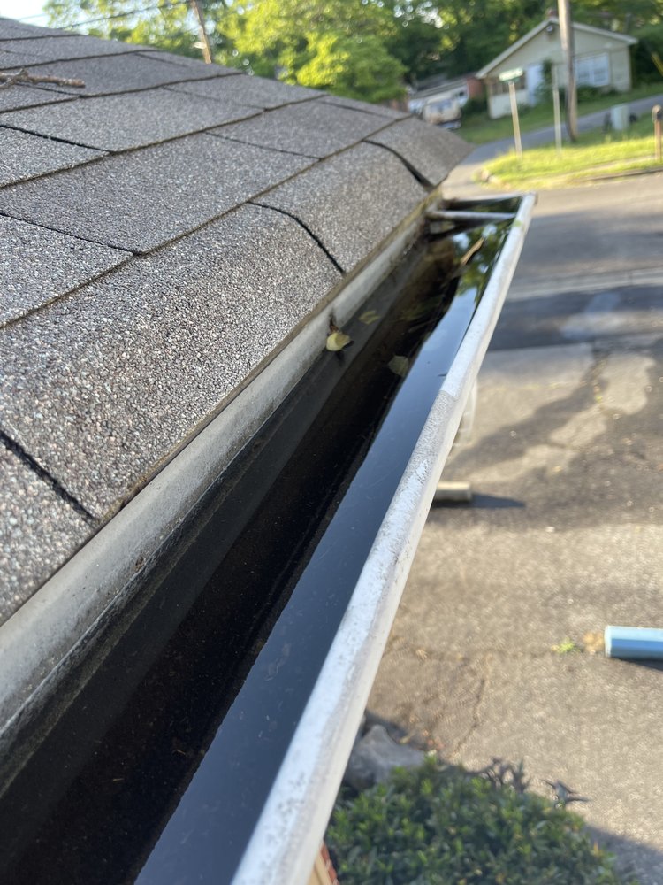 Slide of Marcus Gutters Cleaning