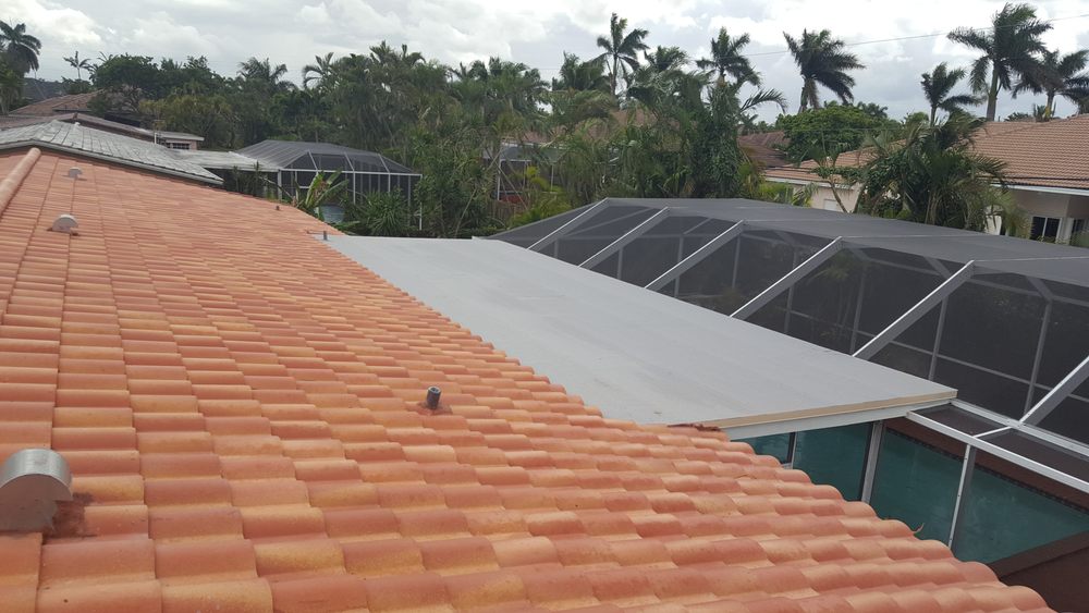 Slide of TNT Roofing