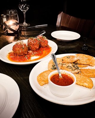 Photo of Sangiovese Ristorante - Indianapolis, IN, US. plates of food on a table